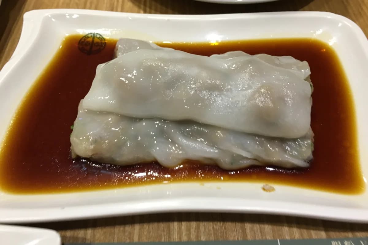 Beef-filled steamed rice rolls glossed with soy sauce