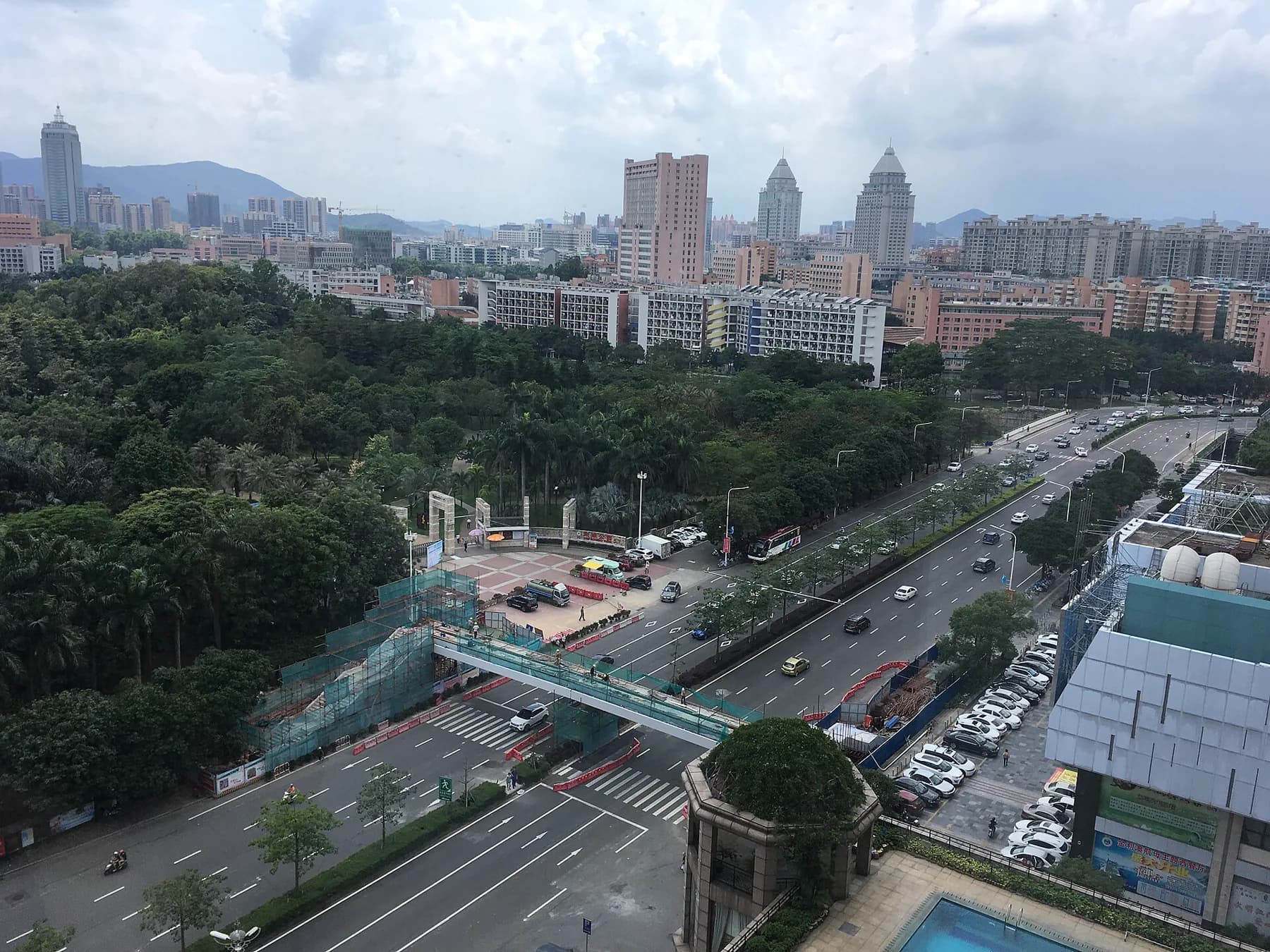 Central Pengjiang roofs and modern Jiangmen skyline