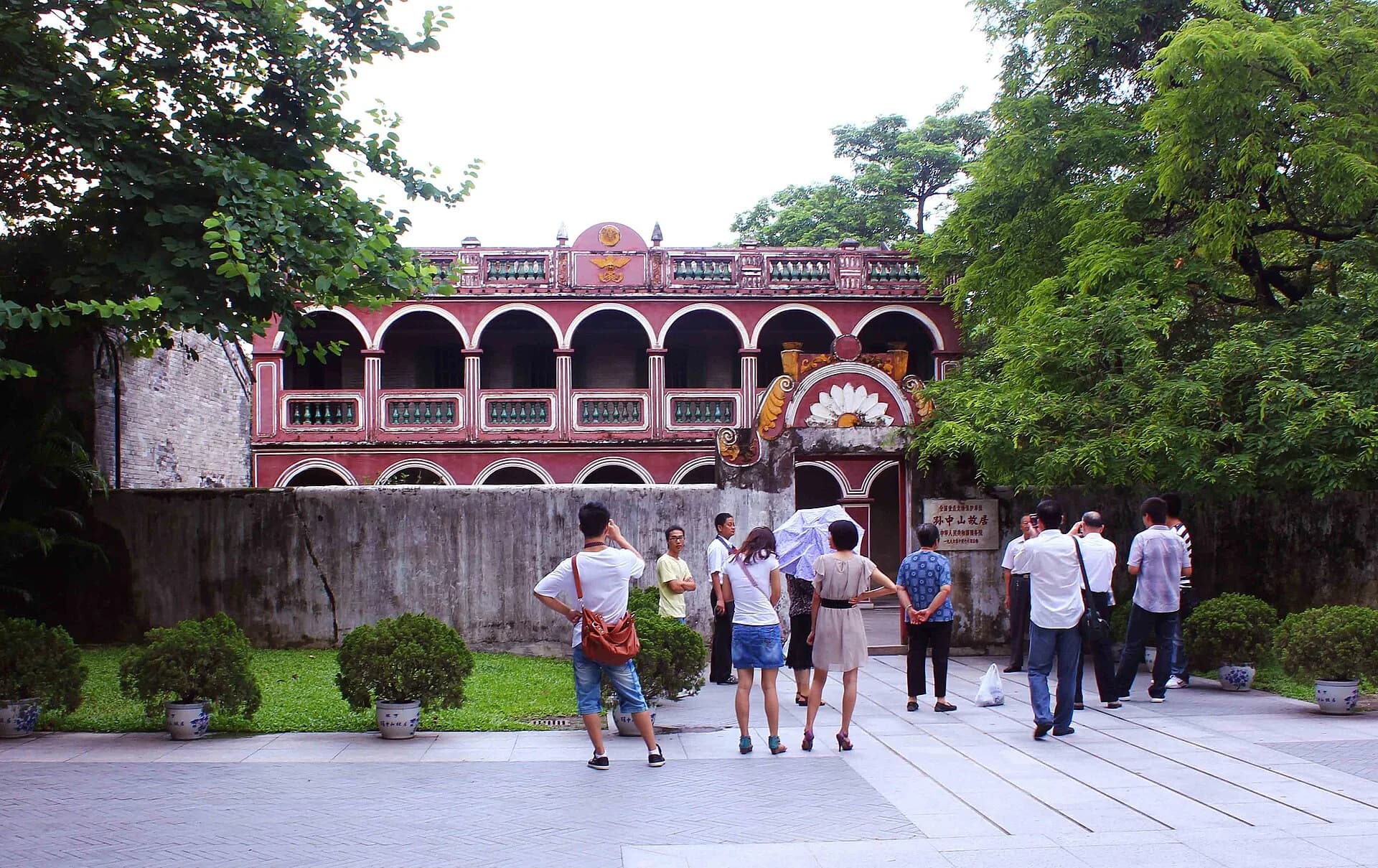 Red-and-white facade of the Former Residence of Dr. Sun Yat-sen in Cuiheng Village
