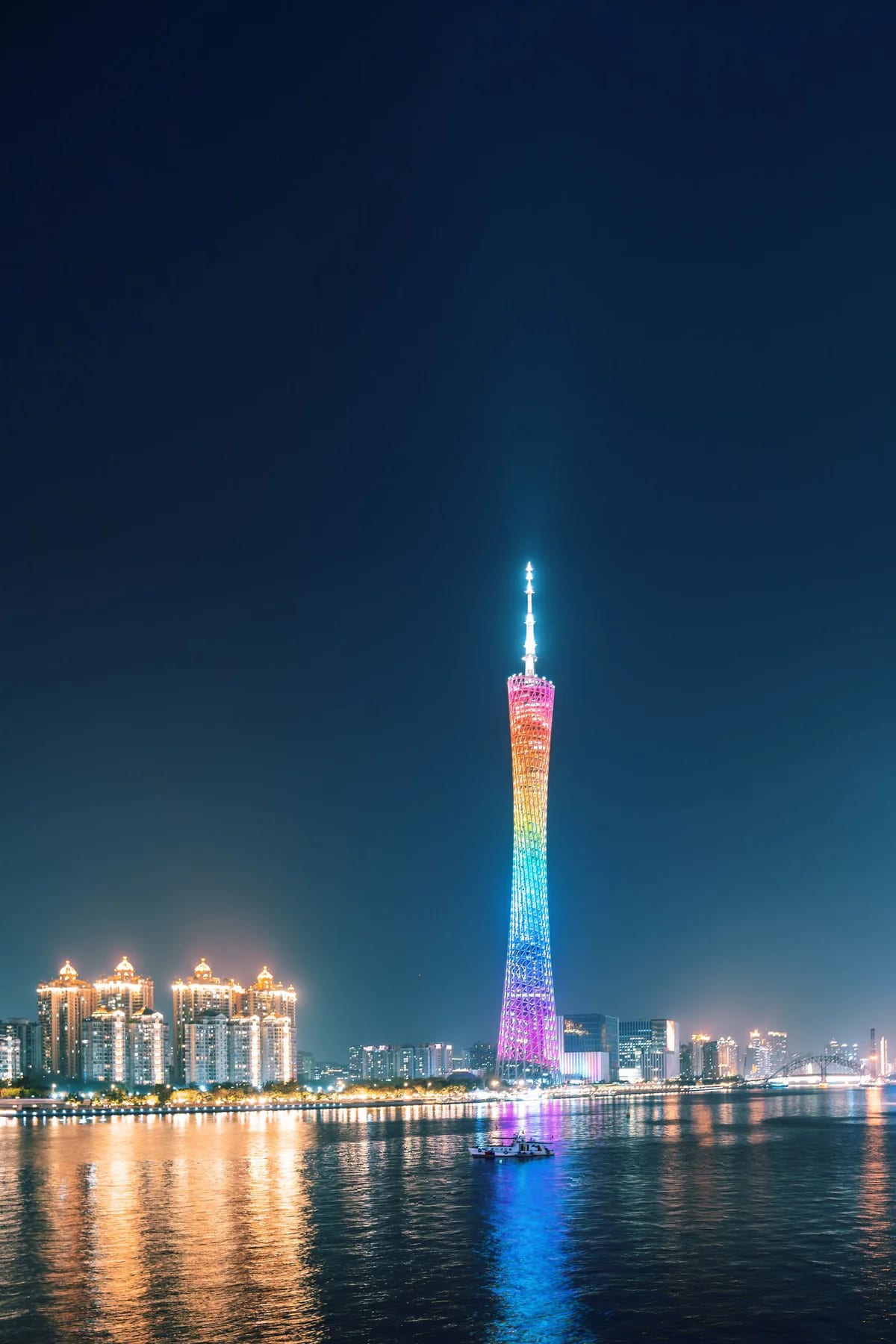 Canton Tower illuminated above the Pearl River at night