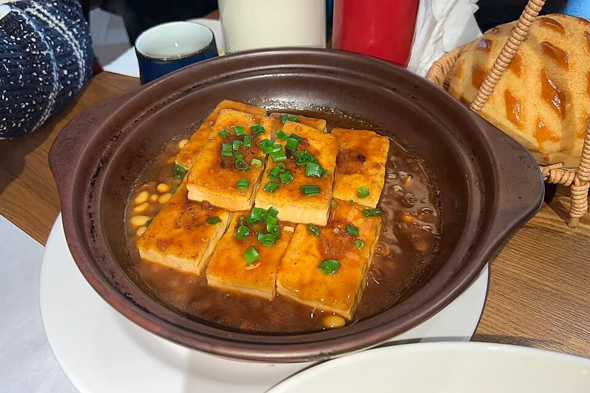 Hakka stuffed tofu served in a clay dish