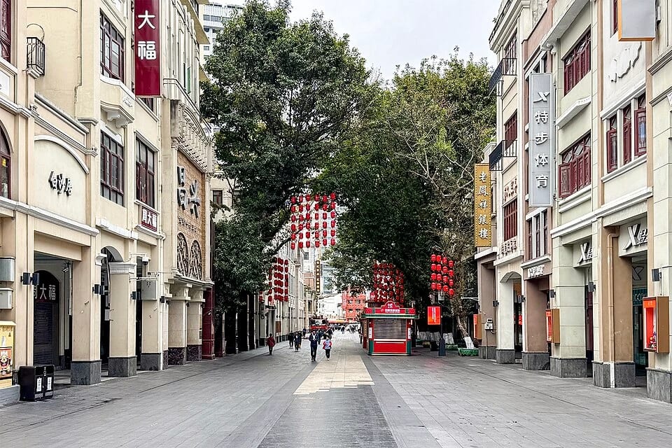 Pedestrians and shops along Beijing Road in Guangzhou
