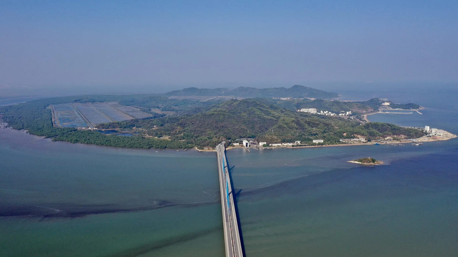 Aerial view of Qi’ao Island, its bridge, mangroves and surrounding water