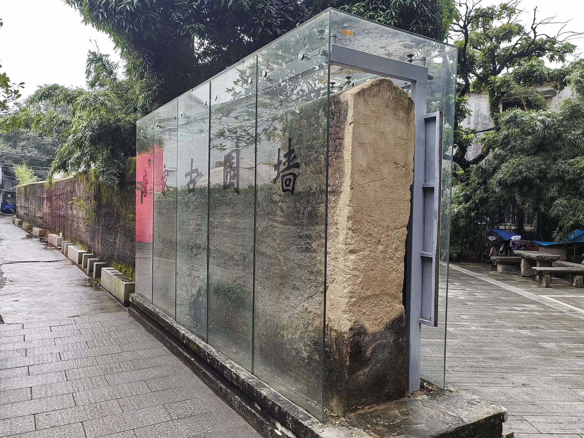 Protected old wall and narrow lane in Tangjiawan Old Town